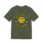 Heavy Lifting Club Tee — Smiley Barbell Gym Shirt